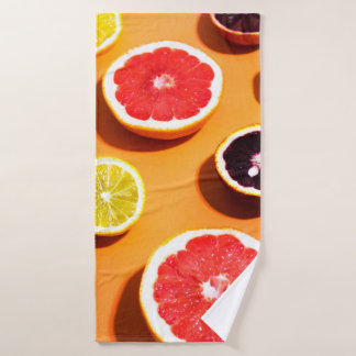 Many variety citrus fruits pattern in sunlight on  bath towel