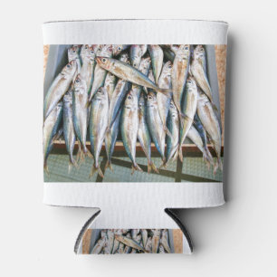 Many whole anchovies lying side by side in crate can cooler
