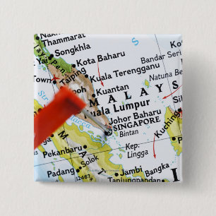 Map pin placed in Singapore on map, close-up