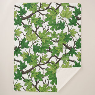 Maple leaves on white sherpa blanket