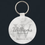 Marble Personalized Script Groomsmen Keychain<br><div class="desc">Add a personal touch to your wedding with personalized groomsmen keychain. This keychain features personalized groomsman's name in grey classic script font style with wedding details in grey classic serif font style and monogram in light grey classic serif font style as background, on white marble background. Also perfect for best...</div>