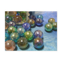Marbles spilling from a jewelry box