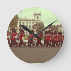 Marching guards at buckingham palace round clock