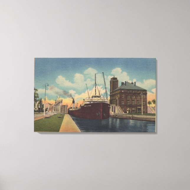 Marie, MI - View of Freighter Leaving MacArthur Canvas Print (Front)