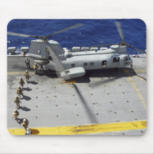 Marines board a CH-46E Sea Knight helicopter Mouse Pad