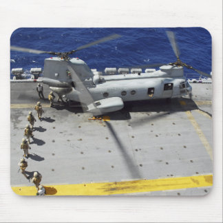 Marines board a CH-46E Sea Knight helicopter Mouse Pad