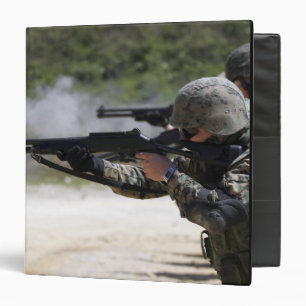 Marines firing shotguns binder
