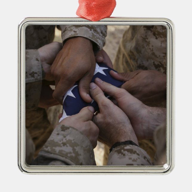 Marines fold an American flag Metal Ornament (Front)