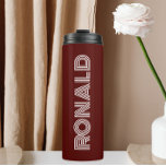 Maroon Modern Typography Personalized Name Thermal Tumbler<br><div class="desc">Keep hot beverages hot and cold beverages cold with this thermal,  insulated thermal tumbler that is a maroon colour along with name printed in white,  modern  typography. Edit your thermal tumbler and replace name with desired name. Perfect for a birthday gift,  wedding groomsman gift,  etc.</div>