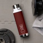 Maroon Modern Typography Personalized Water Bottle<br><div class="desc">Trendy,  vacuum insulated water bottle that features personalized name in white,  modern typography on a maroon colour background. Personalize bottle by editing name and replacing name with your own as desired. Perfect for a birthday gift,  wedding groomsman gift,  etc. Select your water bottle style. Select your water bottle style.</div>