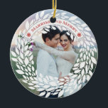 Married and Merry Christmas Ornament<br><div class="desc">This elegant ornament is perfect for a couple celebrating their first married Christmas. It features a wreath around the border and the words "Married and Merry" on a curved frame at the bottom. Add a picture of the happy couple. The back holds the names and the wedding date.</div>