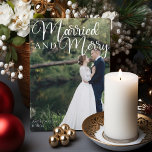 Married and Merry Elegant Wedding Photo Christmas Holiday Card<br><div class="desc">Gorgeous white calligraphy reading Married and Merry over your full wedding photograph for a beautiful newlywed holiday card. This just married couple Christmas card features big cursive script at the top. Add a 2nd couple photo on the back and your personalized text.</div>