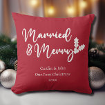 Married and Merry Our First Christmas Newlywed Red Throw Pillow<br><div class="desc">Looking for a way to make your loved ones' first Christmas as a married couple extra special? Our "Our First Christmas Married and Merry" throw pillow in Christmas red is the perfect gift idea! With its clean and modern font and classic holiday colours, this pillow will add a festive touch...</div>