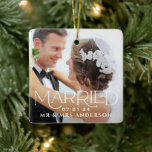 Married Christmas Custom Wedding Photo Monogram Ceramic Ornament<br><div class="desc">Modern and elegant keepsake wedding photo ornament design features "Married" in unique white serif type over your full bleed wedding photo. Personalize the custom "Mr. and Mrs." text with the married last name and wedding date. Photo tip: crop photo to square format before uploading it to the design template.</div>