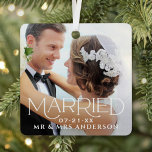 Married Christmas Custom Wedding Photo Monogram Metal Ornament<br><div class="desc">Modern and elegant keepsake wedding photo ornament design features "Married" in unique white serif type over your full bleed wedding photo. Personalize the custom "Mr. and Mrs." text with the married last name and wedding date. Photo tip: crop photo to square format before uploading it to the design template.</div>