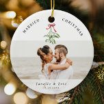 Married Christmas Cute Mistletoe Newlyweds Photo  Ceramic Ornament<br><div class="desc">Cherish your first Christmas together with our 'Married Christmas' ornament. Customized for the newlyweds' joyous memories with 2 favourite wedding photos as well as a cute watercolor mistletoe illustration,  your names and date of nuptials.🎄📸✨ #FirstChristmasJoy #PersonalizedKeepsake</div>