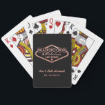 Married in Fabulous Las Vegas Rose Gold Wedding Playing Cards<br><div class="desc">These unique and fun custom "Married in Fabulous Las Vegas" wedding favour playing cards feature a faux rose gold foil design inspired by the Welcome to Las Vegas,  Nevada" sign,  along with monogram text that can be personalized with the couple's name and wedding date. Black background can be modified.</div>