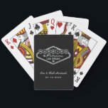 Married in Fabulous Las Vegas Silver Wedding Playing Cards<br><div class="desc">These unique and fun custom "Married in Fabulous Las Vegas" wedding favour playing cards feature a silver faux foil design inspired by the Welcome to Las Vegas,  Nevada" sign,  along with monogram text that can be personalized with the couple's name and wedding date. Black background colour can be modified.</div>