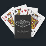 Married in Fabulous Las Vegas Silver Wedding Playing Cards<br><div class="desc">These unique and fun custom "Married in Fabulous Las Vegas" wedding favour playing cards feature a silver faux foil design inspired by the Welcome to Las Vegas,  Nevada" sign,  along with monogram text that can be personalized with the couple's name and wedding date. Black background colour can be modified.</div>