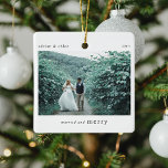Married & Merry Newlyweds Photo Keepsake Ceramic Ornament<br><div class="desc">A stylish photo holiday christmas tree ornament with classic typography "Married and Merry" in black on a clean simple minimal white background. The photo,  text,  name/s and year can be easily customized to make this ornament unique and personal to you. A simple,  minimalist and contemporary christmas design for newlyweds!</div>