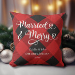 Married Merry Our 1st Christmas Newlywed Red Plaid Throw Pillow<br><div class="desc">Looking for a way to make your loved ones' first Christmas as a married couple extra special? Our "Our First Christmas Married and Merry" throw pillow in red plaid is the perfect gift idea! With its clean and modern font and classic holiday colours, this pillow will add a festive touch...</div>