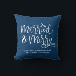 Married & Merry Our first Christmas Married Blue Throw Pillow<br><div class="desc">Celebrate your first Christmas as a married couple with this charming and customizable throw pillow. The pillow features a beautiful "Married and Merry" message in elegant script, conveying the joy and excitement of the holiday season. Personalize the pillow by adding the last name of the newlywed couple and the year...</div>