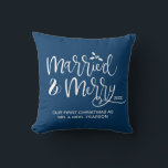 Married & Merry Our first Christmas Married Blue Throw Pillow<br><div class="desc">Celebrate your first Christmas as a married couple with this charming and customizable throw pillow. The pillow features a beautiful "Married and Merry" message in elegant script, conveying the joy and excitement of the holiday season. Personalize the pillow by adding the last name of the newlywed couple and the year...</div>