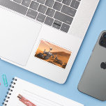 Mars Science Laboratory Curiosity Rover.<br><div class="desc">Artist concept of Mars Science Laboratory Curiosity rover, a mobile robot for investigating Mars' past or present ability to sustain microbial life. In this picture, the rover examines a rock on Mars with a set of tools at the end of the rover's arm, which extends about 7 feet. Two instruments...</div>