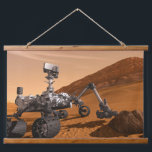 Mars Science Laboratory Curiosity Rover. Hanging Tapestry<br><div class="desc">Artist concept of Mars Science Laboratory Curiosity rover, a mobile robot for investigating Mars' past or present ability to sustain microbial life. In this picture, the rover examines a rock on Mars with a set of tools at the end of the rover's arm, which extends about 7 feet. Two instruments...</div>