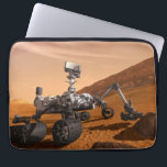Mars Science Laboratory Curiosity Rover. Laptop Sleeve<br><div class="desc">Artist concept of Mars Science Laboratory Curiosity rover, a mobile robot for investigating Mars' past or present ability to sustain microbial life. In this picture, the rover examines a rock on Mars with a set of tools at the end of the rover's arm, which extends about 7 feet. Two instruments...</div>