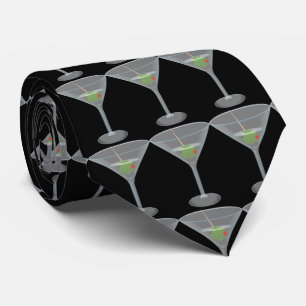 martini with olives. black background tie