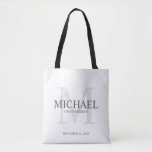 Masculine Personalized Groomsmen Tote Bag<br><div class="desc">Add a personal touch to your wedding with personalized groomsmen tote bag. This bag features personalized groomsman's name with title and wedding date in grey and monogram in light grey as background, in classic serif font style, on white background. Also perfect for best man, father of the bride, ring bearer...</div>