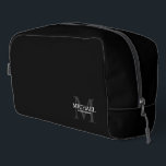 Masculine Personalized Monogram and Name Groomsmen Dopp Kit<br><div class="desc">Add a personal touch to your wedding with personalized groomsmen gift.
This design features personalized groomsman's name with title in white and monogram in light grey as background,  in classic serif font style on black background.

Also perfect for best man,  father of the bride and more.</div>