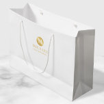 Masculine White and Gold Personalized Groomsmen Large Gift Bag<br><div class="desc">Add a personal touch to your wedding with personalized groomsmen gift bag. This gift bag features white monogram in gold circle element with name and title in gold professional font style on white background. Also perfect for best man, father of the bride, ring bearer and more. Please Note : The...</div>