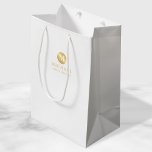 Masculine White and Gold Personalized Groomsmen Medium Gift Bag<br><div class="desc">Add a personal touch to your wedding with personalized groomsmen gift bag. This gift bag features white monogram in gold circle element with name and title in gold professional font style on white background. Also perfect for best man, father of the bride, ring bearer and more. Please Note : The...</div>