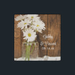 Mason Jar and White Daisies Country Barn Wedding Stone Magnets<br><div class="desc">Customize these charming Mason Jar and White Daisies Country Barn Wedding Stone Magnets with the personal names of the bride and groom and specific marriage ceremony date. These rustic chic custom ranch style wedding magnets feature a quaint floral photograph of a glass canning jar filled with a bouquet of white...</div>