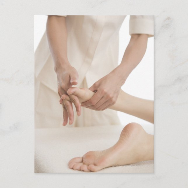 Massage therapist applying foot massage 2 postcard (Front)