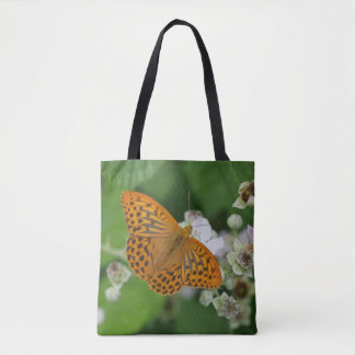 Massive bee,  or maybe not, on a bag. tote bag