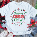 Matching Christmas Cousin Crew T-Shirt<br><div class="desc">What better way to bring your family together this Christmas than with a set of fun matching family cousin Christmas t-shirts? Featuring the cozy saying, ‘Christmas Cousin Crew’, along with the year, and bright, festive red and green Christmas string lights, your family will look great while celebrating the season of...</div>