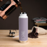 Mauve Modern Typography Personalized Water Bottle<br><div class="desc">Trendy, vacuum insulated water bottle that features personalized name in white, modern typography on a trendy, mauve colour background. Personalize bottle by editing name and replacing name with your own as desired. Perfect for a birthday gift, wedding groomsman gift, etc. Select your water bottle style. Select your water bottle style....</div>