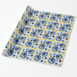 Maxfield Parrish-y Hanukkah Elf Wrapping Paper<br><div class="desc">Cheery Hanukkah gift-wrap has tiles of black on white polka dots adorned w/ dreidels, cornflower blue orbs & medallions featuring Leslie Sigal Javorek's whimsical variation of a pre-WWI era Maxfield Parrish elfish Lamplighter character w/ polka dot leggings, cobalt blue pancho, a fully lit menorah on his shoe, the greeting, "Happy...</div>