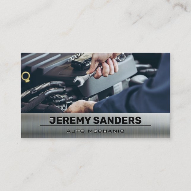 Mechanic Using Wrench on Engine Business Card (Front)