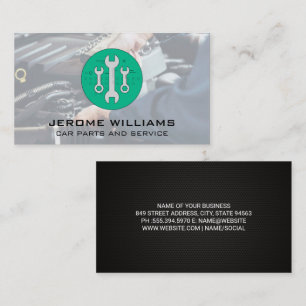 Mechanic Working on Engine with Wrench's Business Card