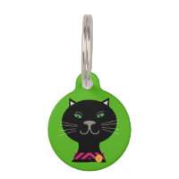 Chat noir avec les yeux verts sur l'arrière - plan