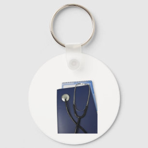 medical stethoscope on blue folder keychain