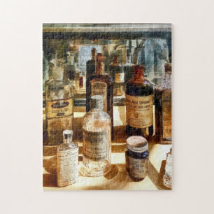 Medicine Bottles in Glass Case Jigsaw Puzzle