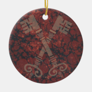 Medieval 21st keys against dark red marble ceramic ornament