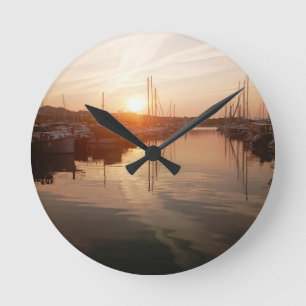 Mediterranean Sunrise over a Marina Wall Clock