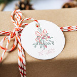 Meet Me Under the Mistletoe Favour Tags<br><div class="desc">If you're feeling in the festive spirit,  this elegant mistletoe design is just the thing. A bunch of mistletoe tied with a red ribbon is just the place to meet to get some Christmas kisses. Change out the handwritten message to something else if you like. Matching products available.</div>
