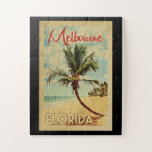 Melbourne Palm Tree Vintage Travel Jigsaw Puzzle<br><div class="desc">A uniquely retro mid-century modern Melbourne Florida art print in vintage travel poster style. It features a curved palm tree on sandy beach with ocean under a blue cloudy sky.</div>
